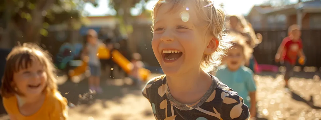 children laughing and playing together during a group outdoor game at a preschool.